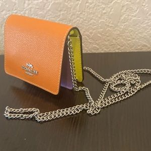 NWT Coach mini cross-body neon wallet